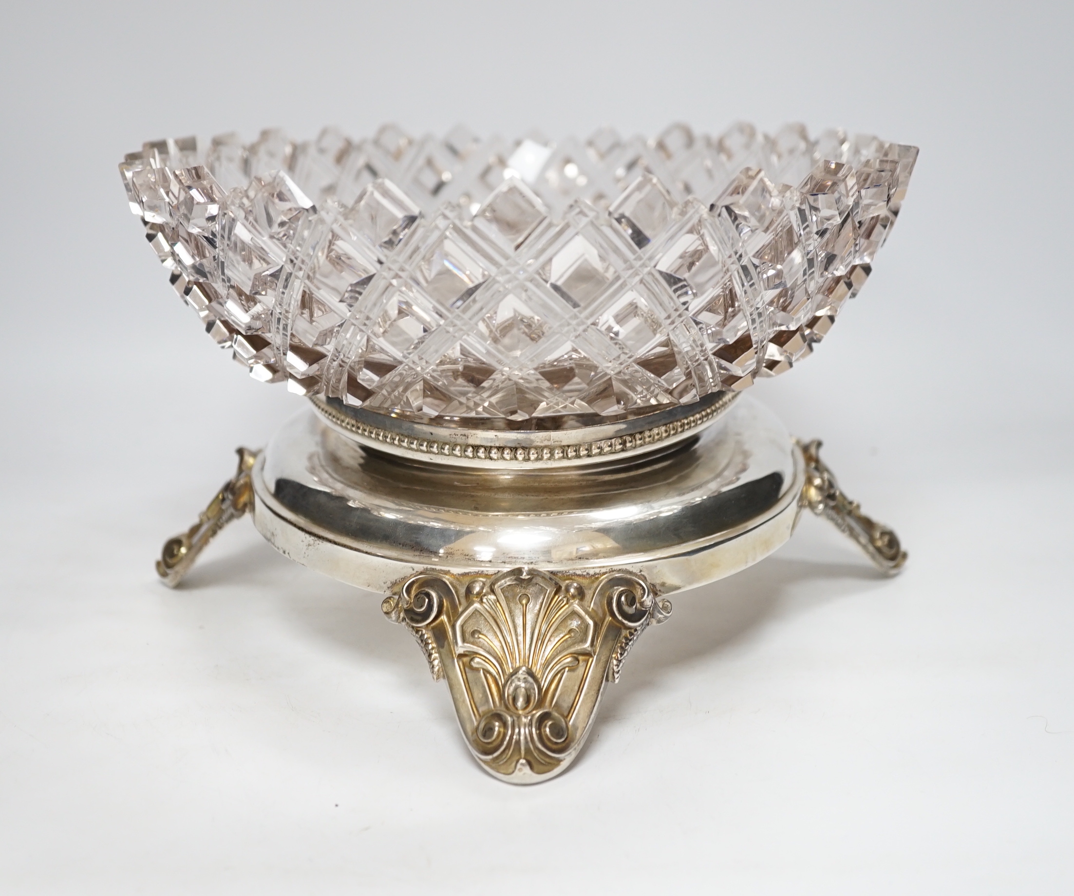 A heavy cut glass centrepiece with Dutch silver base, 39cm